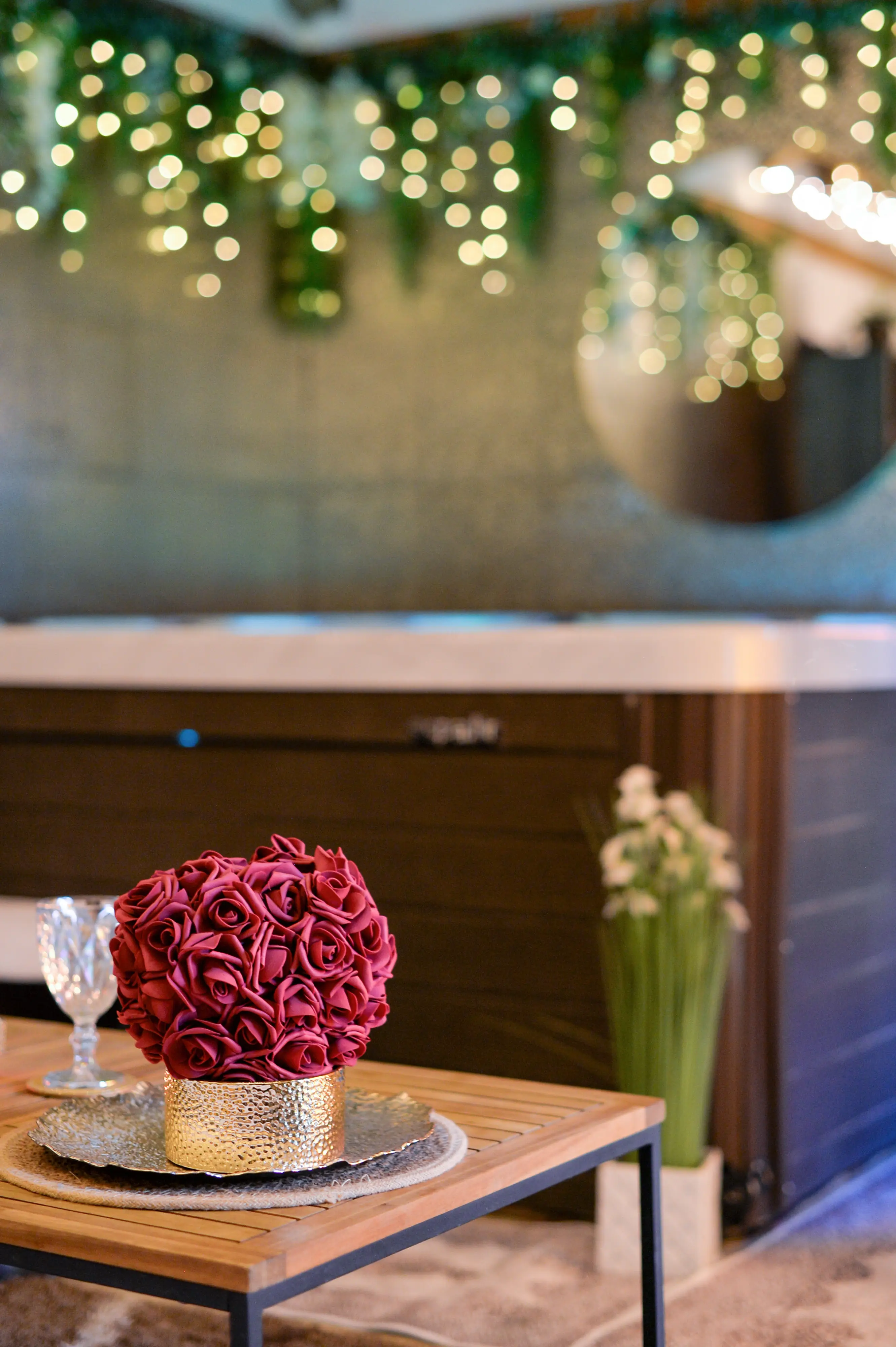 Soft-focus bouquet with jacuzzi cabinet and flowers
