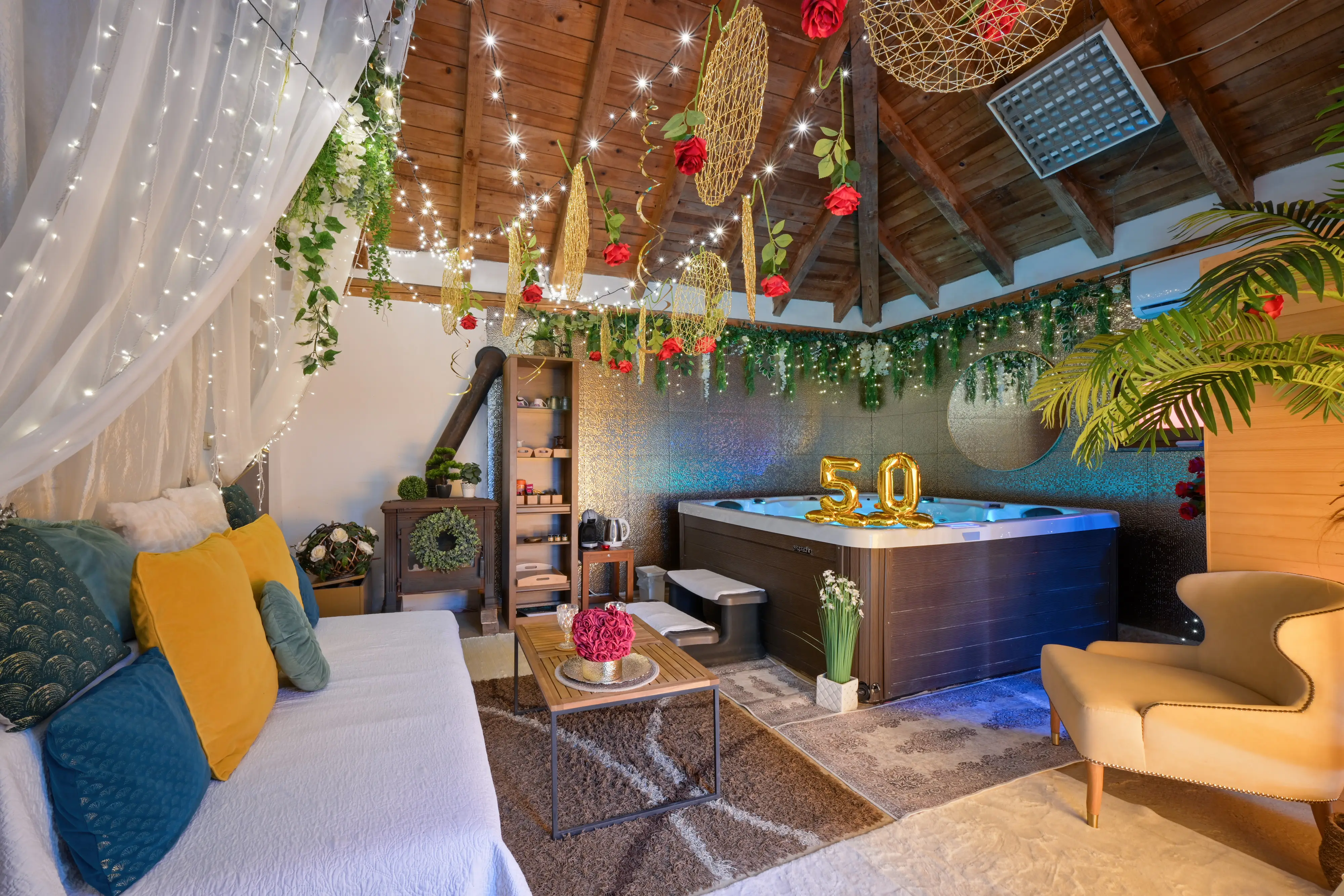 Spa corner with drapery, hanging decor, and jacuzzi