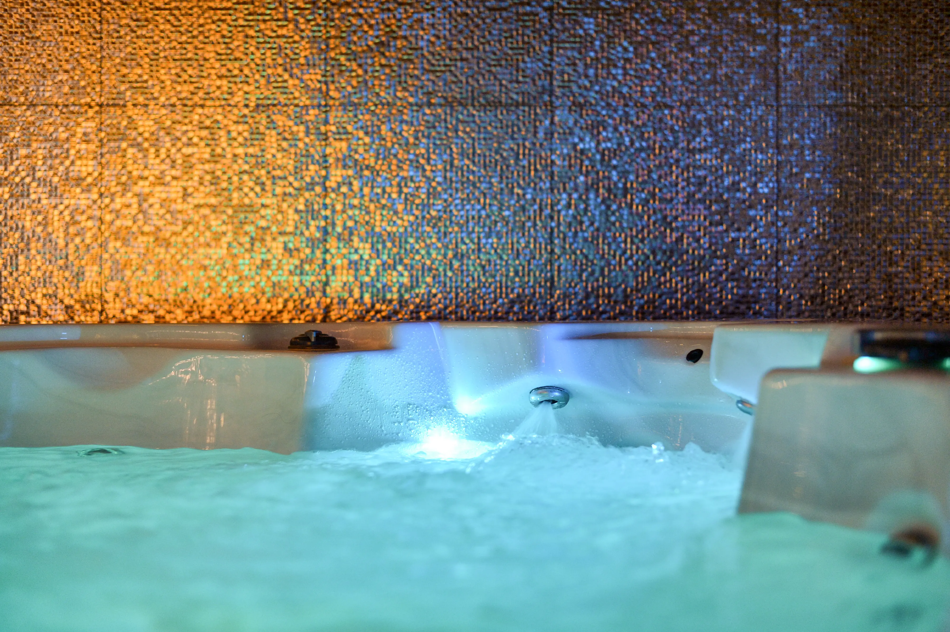 Abstract metallic wall texture with jacuzzi edge