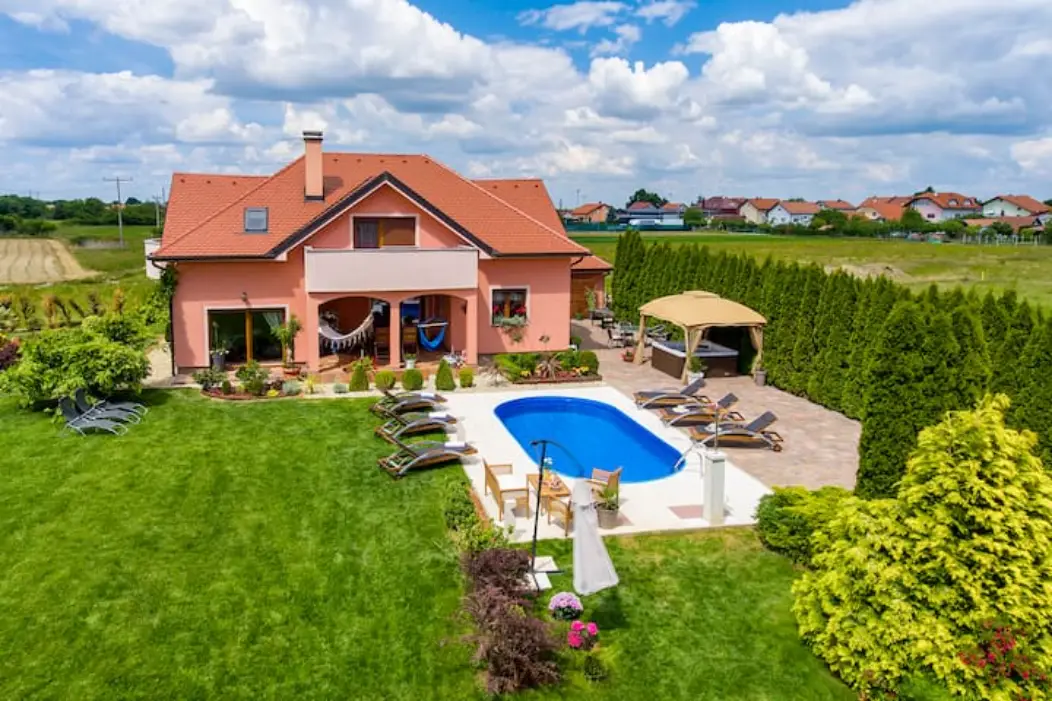 Elevated exterior view of house and pool area